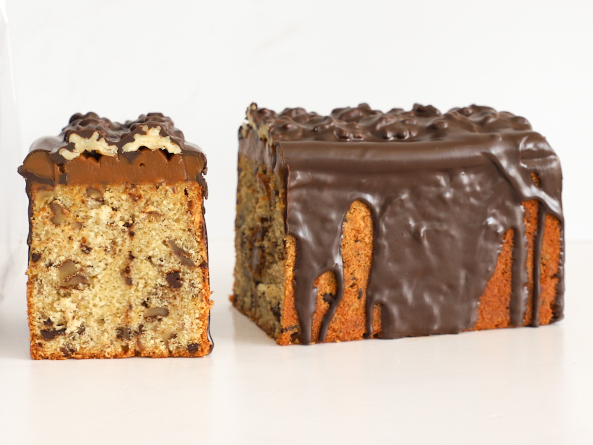 BUDÍN HAMBURGUÉS <br><span style="font-family: 'Spartan', sans-serif;font-size:13px;"><p> Clásico budín hamburgués especial para las Fiestas, con trozos de nueces y chocolate semi amargo. Arriba tiene una capa de dulce de leche, más nueces y está bañado con chocolate...</p><b>$45.000 (Por unidad - 1,100 kg.) </b></span>