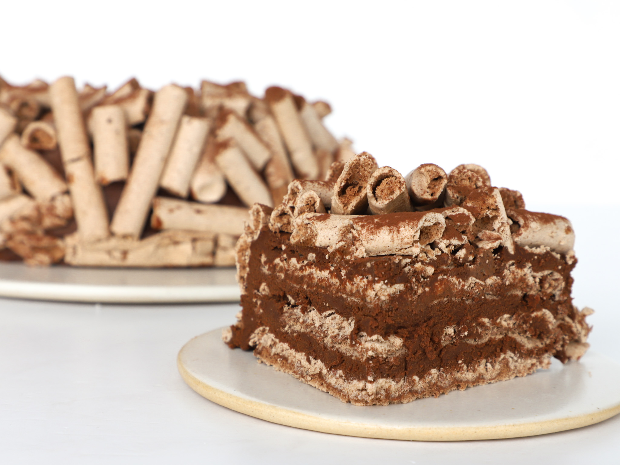 TORTA CONCORDE <br><span style="font-family: 'Spartan', sans-serif;font-size:13px;"><p>Mousse de chocolate al 60% cacao · Discos de merengue de cacao en su interior y palitos por fuera...</p>$53.000<b>(No contiene harina, pero no es libre de gluten.)</b></span>