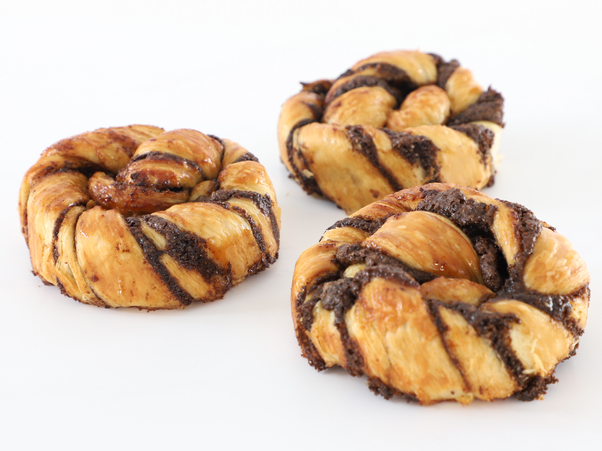 ROLL DE CANELA <br><span style="font-family: 'Spartan', sans-serif;font-size:13px;"><p>Roll relleno con canela. </p><b>$4.600 (Por unidad.)</b></span>
